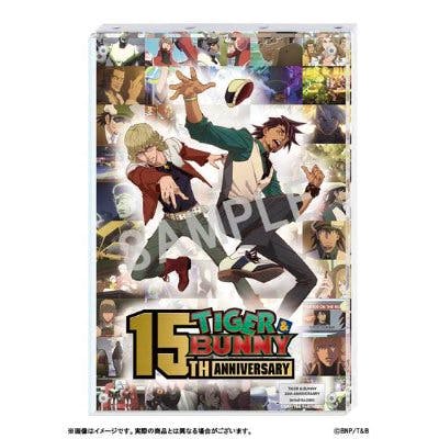 A rectangular acrylic block showing Tiger & Bunny 15th Anniversary collage artwork with a "SAMPLE" watermark.
