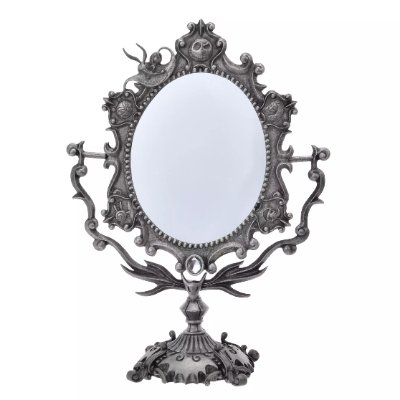 Silver-tone ornate oval standing compact mirror with decorative themed frame from The Nightmare Before Christmas collection.