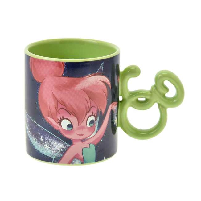 Green ceramic Tinker Bell mug showing a Tinker Bell illustration, green interior, and a Mickey-head shaped handle.