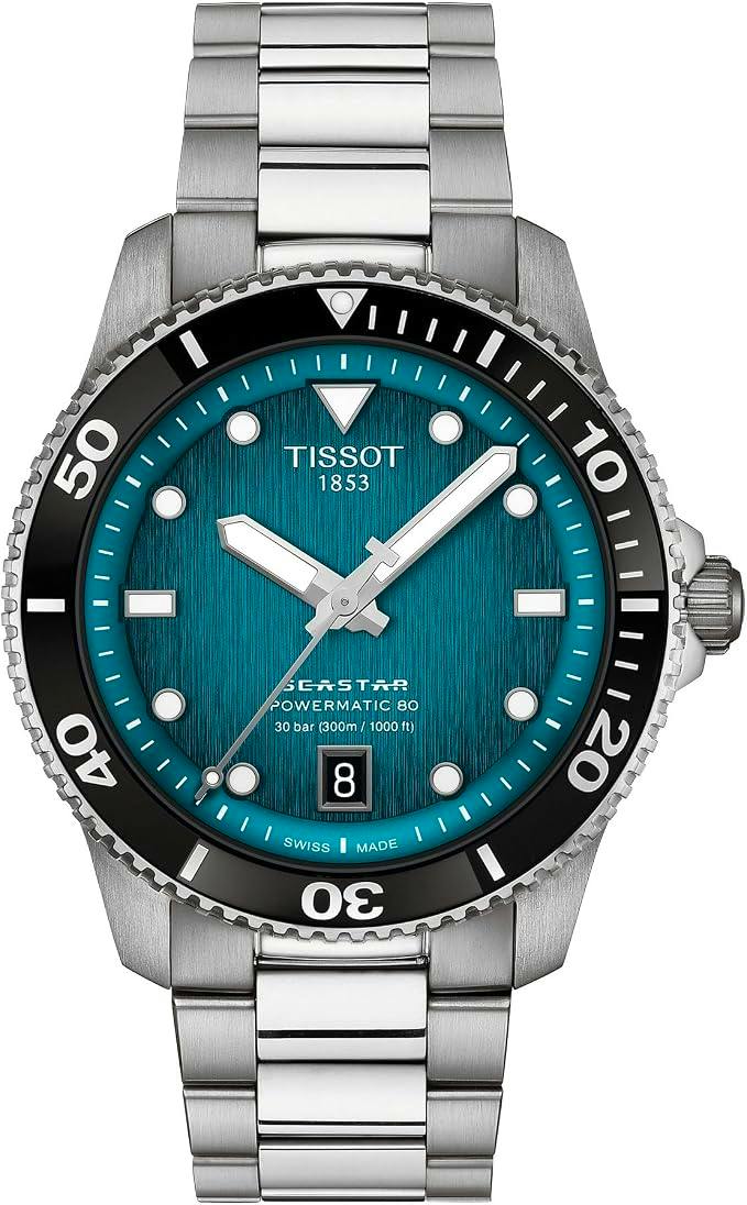 Front view of the TISSOT SEASTAR 1000 Powermatic 80 men's stainless steel watch with a turquoise gradient dial, black bezel, and metal bracelet.