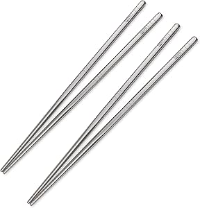 Four unpainted square titanium chopsticks (two pairs) displayed on a white background.