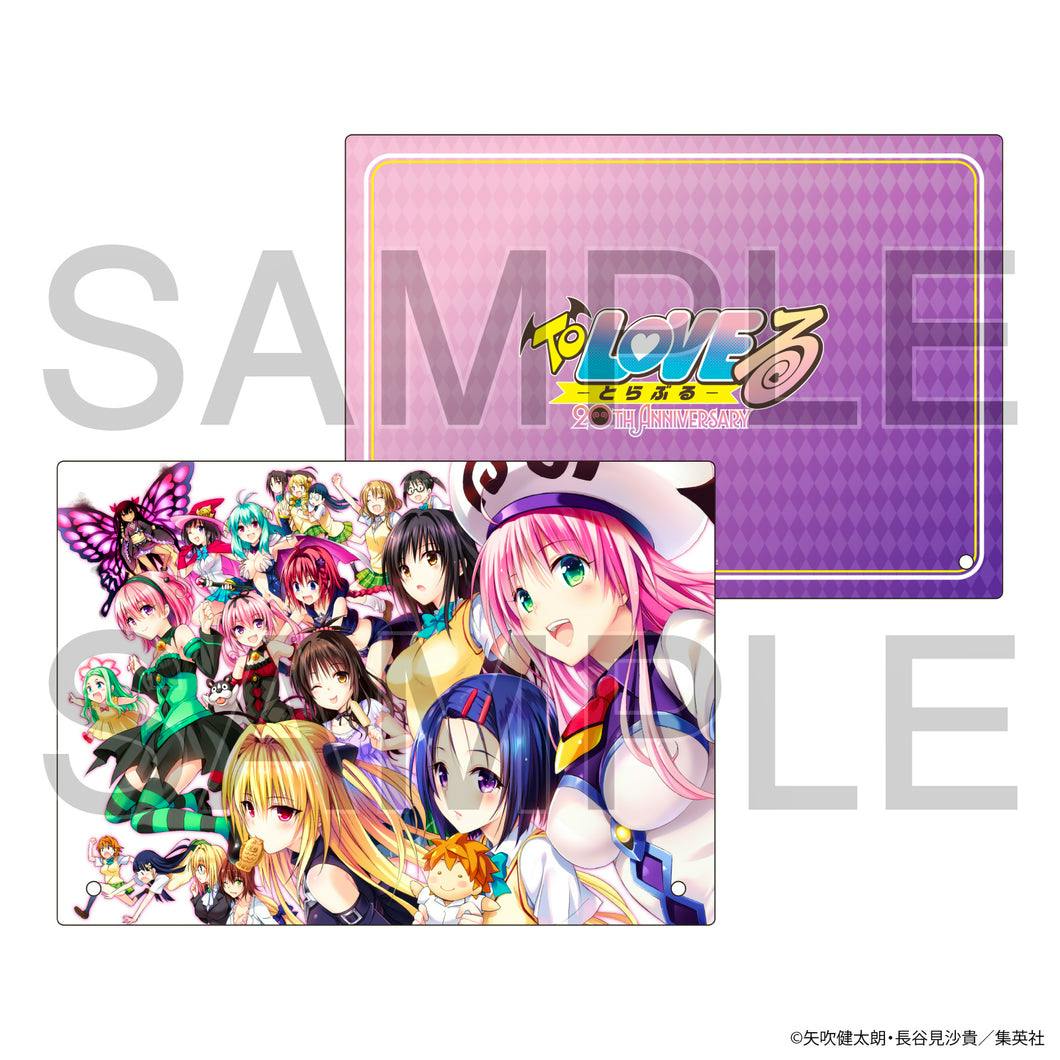 Two views of the To LOVEる 20th Anniversary acrylic board A showing the full character illustration on one side and a purple logo-patterned back.