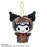 Front view of a small plush keychain showing Sanrio character Kuromi wearing a brown Godzilla-style costume with a gold ball chain.
