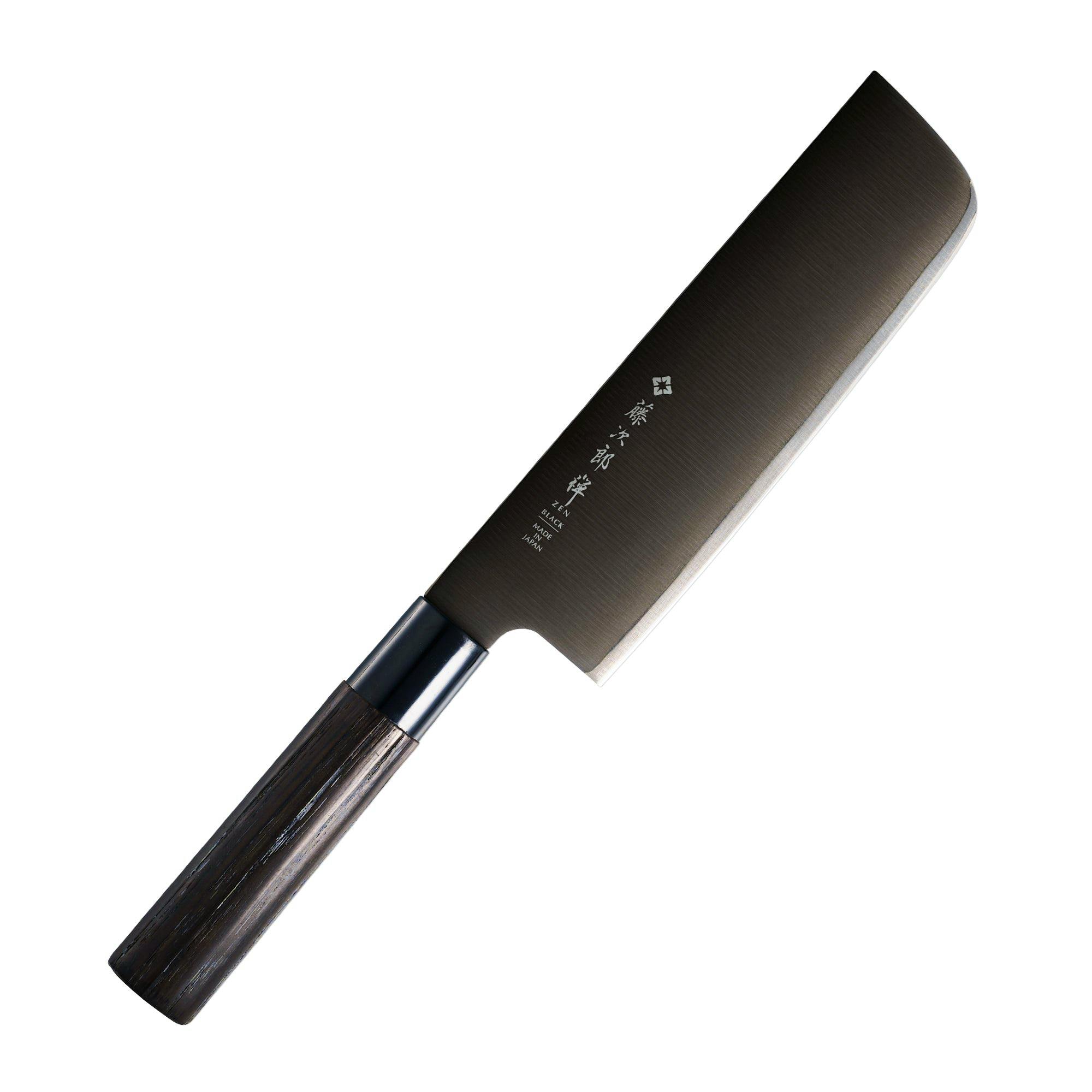 Close-up of the chef knife blade and wooden handle on a white background.