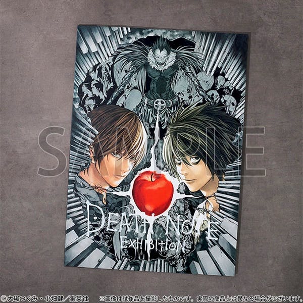 Photograph of the clear file showing Death Note exhibition artwork with two characters flanking a red apple and the text "DEATH NOTE EXHIBITION".