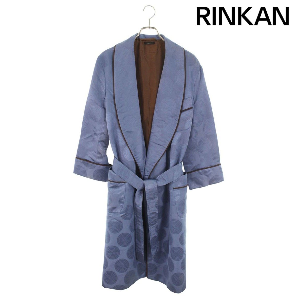Front view of a blue Tom Ford silk coat with a sash belt and circular pattern hanging on a hanger.