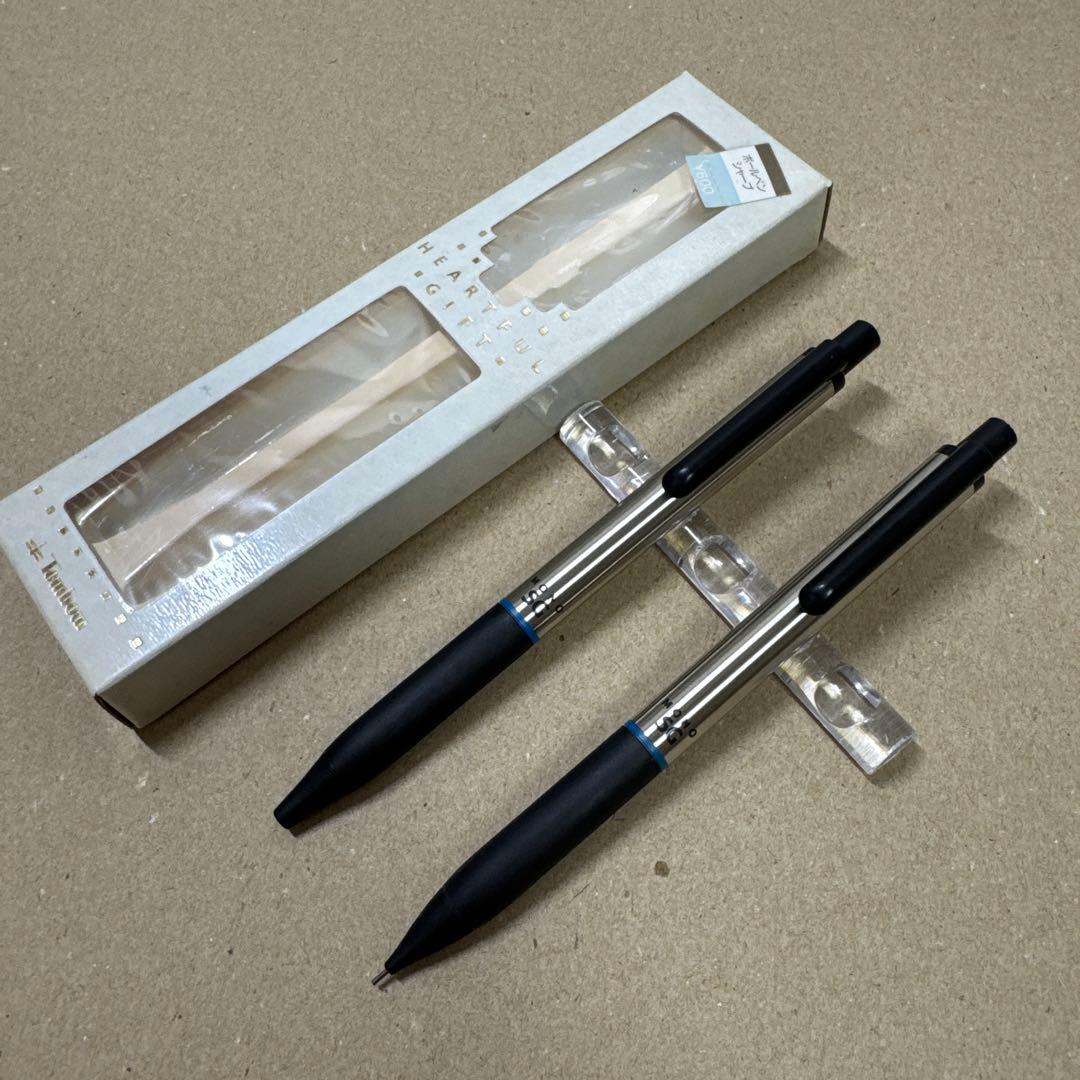 Two TOMBOW MONO SG mechanical pencils with their box on a surface.