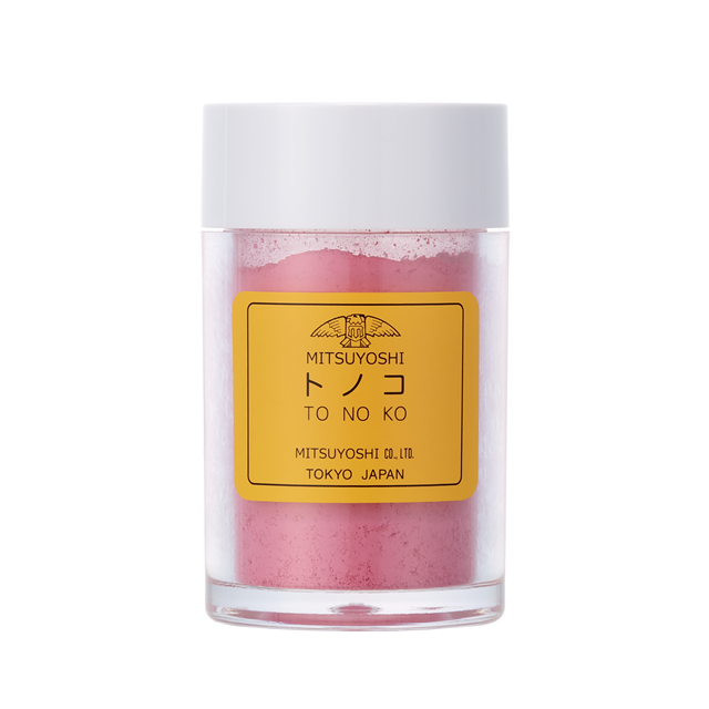 Clear jar of pink face powder with a white lid and a yellow Mitsuyoshi label.