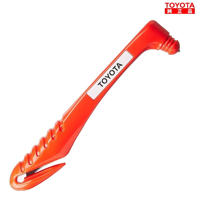 Red TOYOTA-branded car emergency hammer (Rescue Hammer) showing an integrated seatbelt cutter and pointed breaking head.
