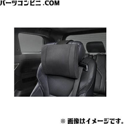 Black Toyota headrest pillow installed on a car seat interior.