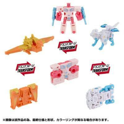 Multiple Transformers cassette toy figures shown in robot and alternate modes on a white background.