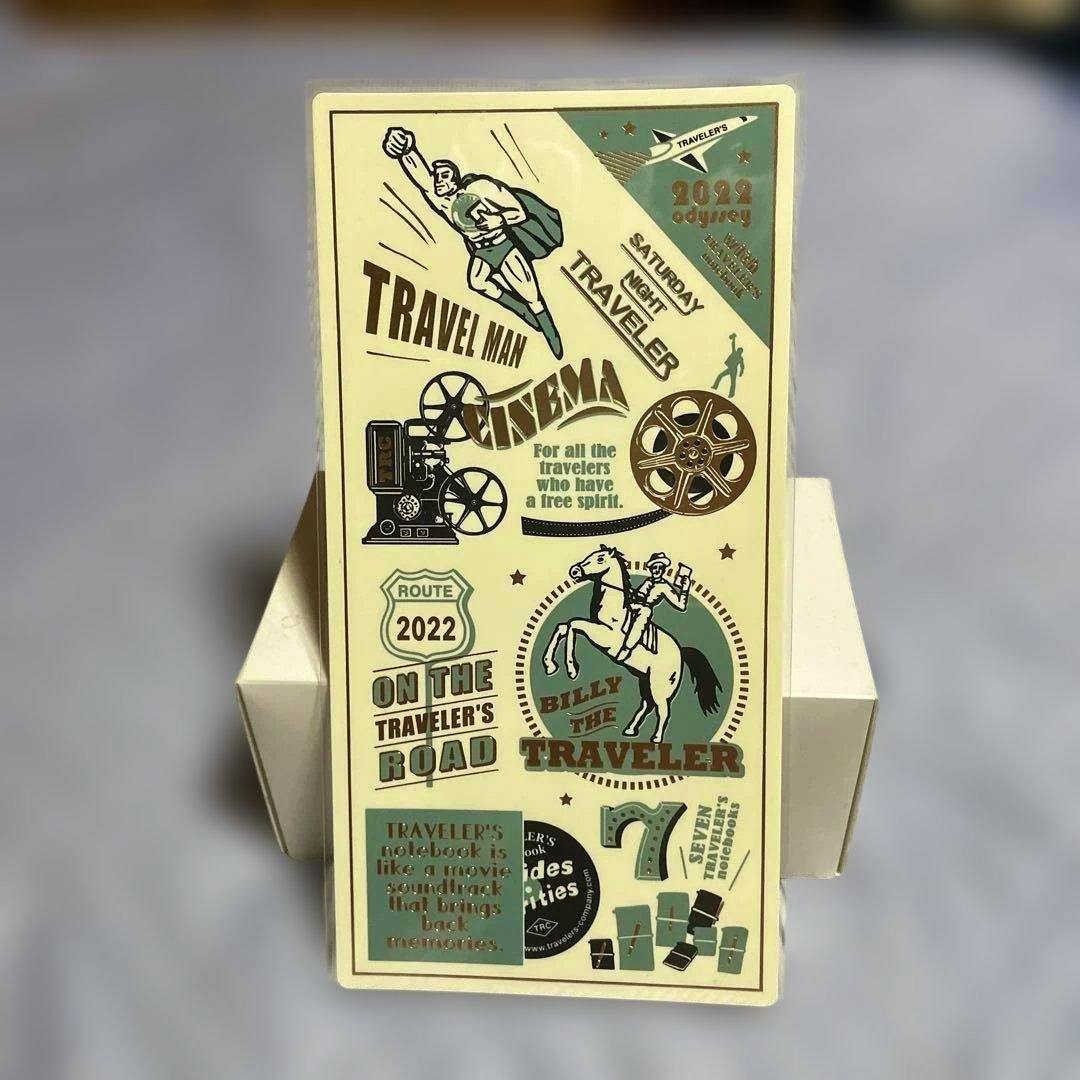 Front of the Traveler's Notebook 2022 regular-size mat showing vintage-style travel illustrations and text.