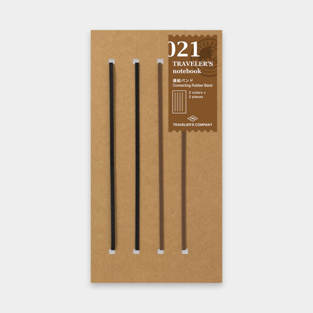 Four connecting rubber bands for a Traveler's notebook displayed on a brown card with the product label.