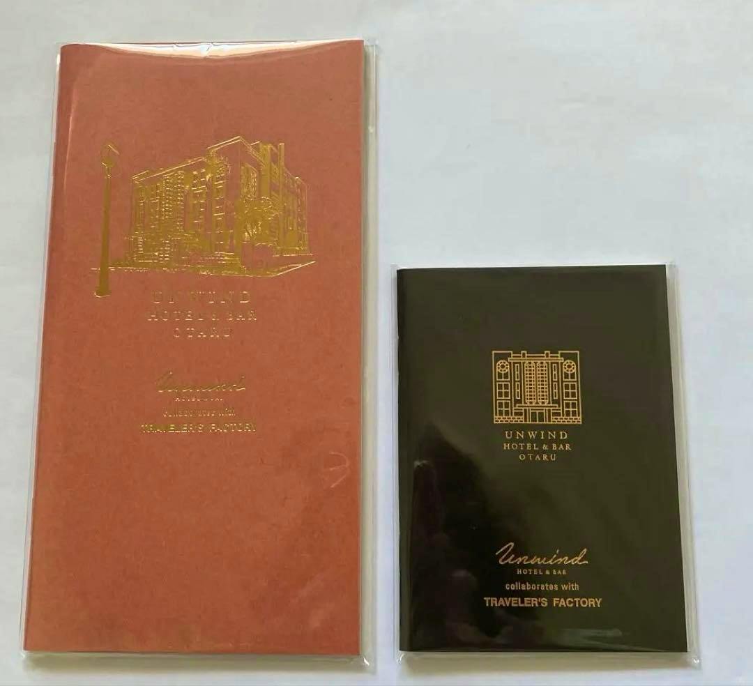 Two sealed Traveler’s Notebook refill booklets for UNWIND OTARU shown side by side on a white background.