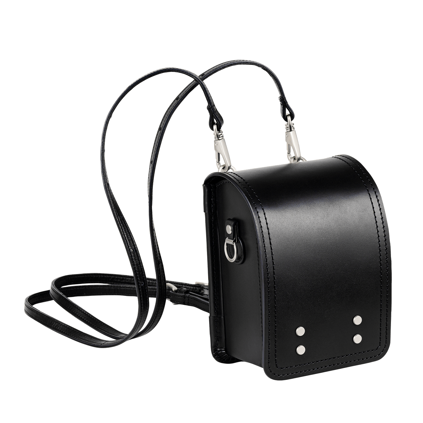 A black cow leather TSUCHIYA L/AND mini bag shown from a three-quarter angle with its flap closed and a long shoulder strap visible.