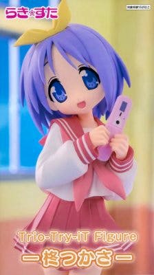Photograph of the Hiiragi Tsukasa figure from "Lucky Star" wearing a pink-and-white school uniform and holding a pink phone.