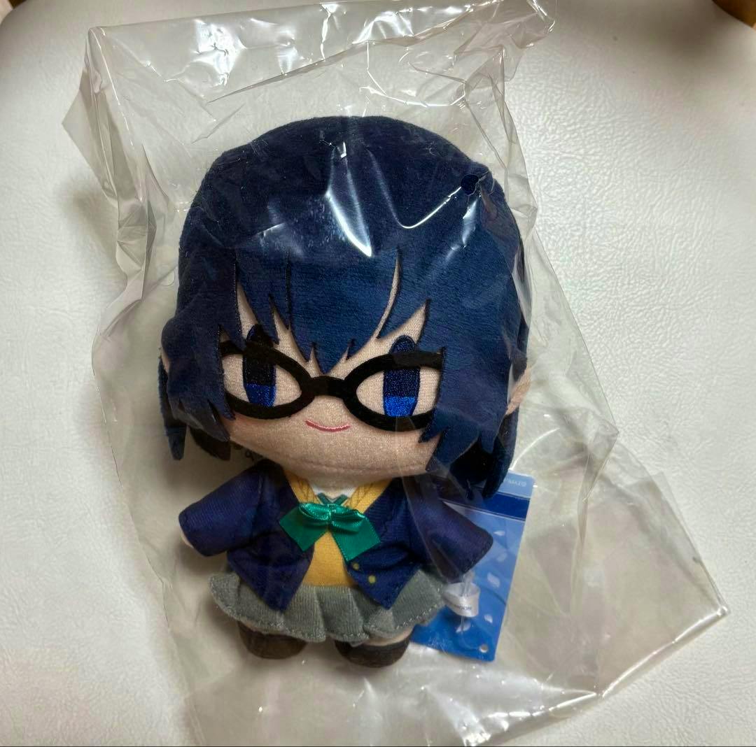 Front view of a sealed Ciel plush toy in its clear plastic bag, showing glasses and a school uniform.