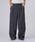 Front view of the TUCK WIDE GURKHA SLACKS worn by a model.