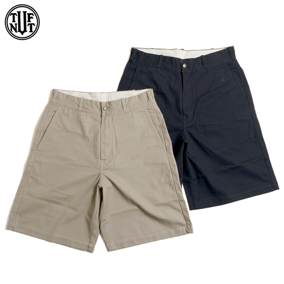 Two pairs of men's cotton twill work shorts (khaki and navy) laid flat on a white background.