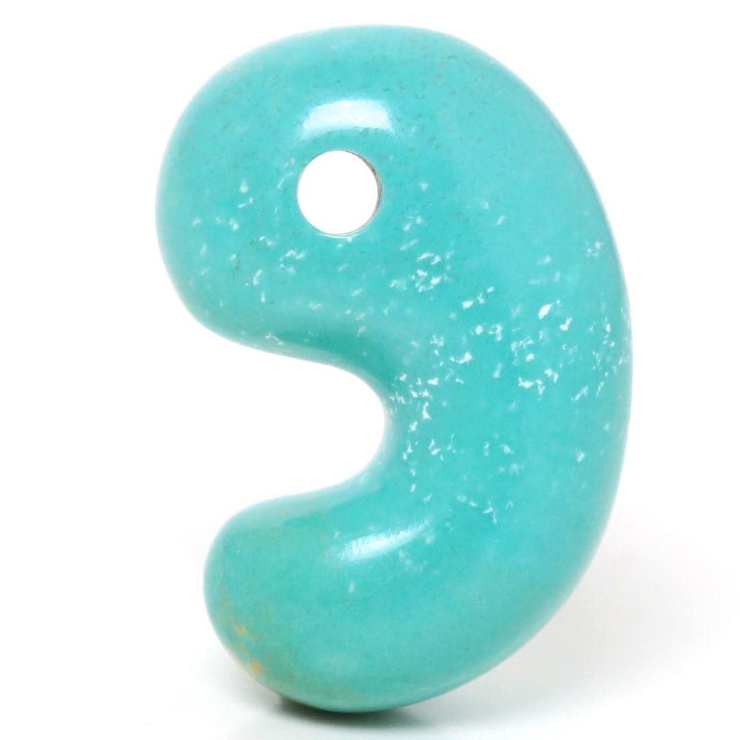 Close-up of a turquoise Izumo-style magatama pendant (16mm) made of jade on a white background.