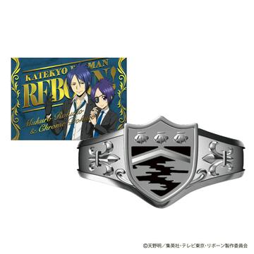 Front view of the Vongole-style shield ring labeled “Kiri,” shown next to the included illustrated special card.