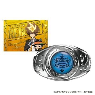 Silver Vongola ring with a blue center emblem shown alongside a collectible character card.