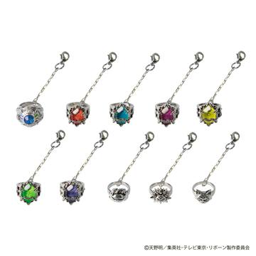 Ten non-precious metal pendant-style collection charms with colored gem centers and short lobster-claw chains arranged on a white background.