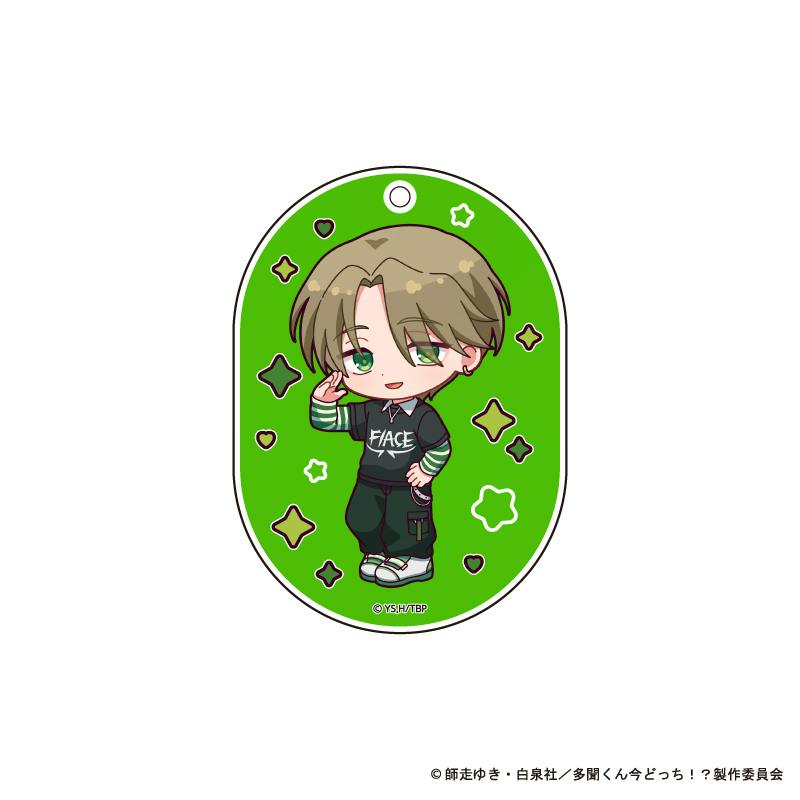 Acrylic keychain artwork showing a chibi illustration of 橘 敬人 on a green oval background with a top hole for a carabiner.