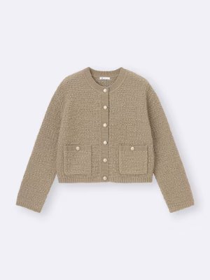 Front view of the tweed knit cardigan with button closure and front patch pockets.