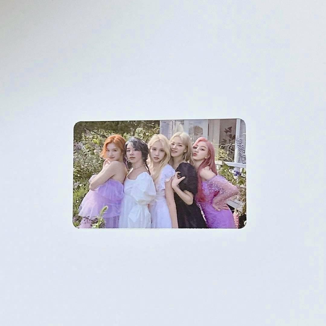 Photocard for TWICE MORE＆MORE showing a group of five people posing together outdoors in dresses, centered on a white background.