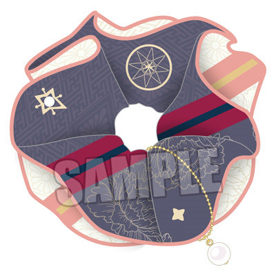 Illustration of the hair scrunchie showing navy and pink patterned fabric with a small hanging charm.