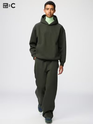 Male model shown full-length wearing the men's wide pants described.