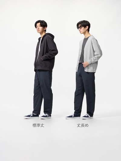 Two male models wearing the men's pants in two different length variations, shown full-length against a white background.