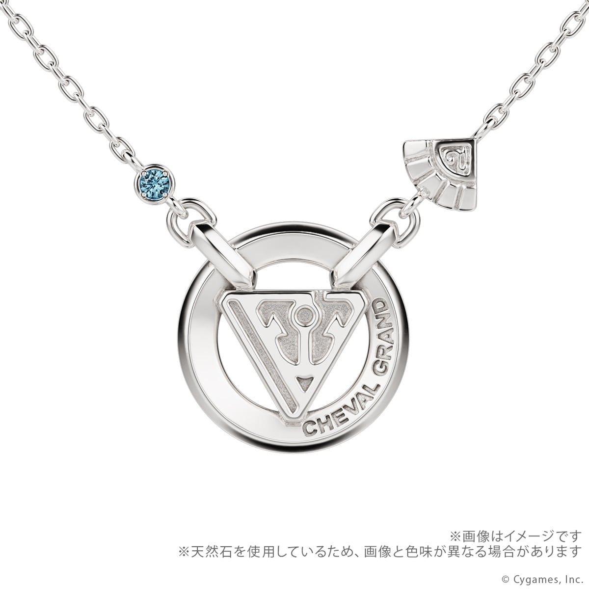 Close-up photo of the silver Cheval Grand motif necklace pendant on a chain with a small blue stone accent.