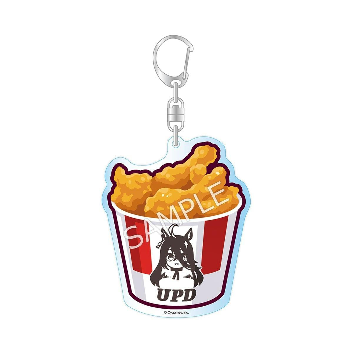 Acrylic keychain showing a bucket of fried chicken with a Manhattan Cafe character illustration and metal clasp.