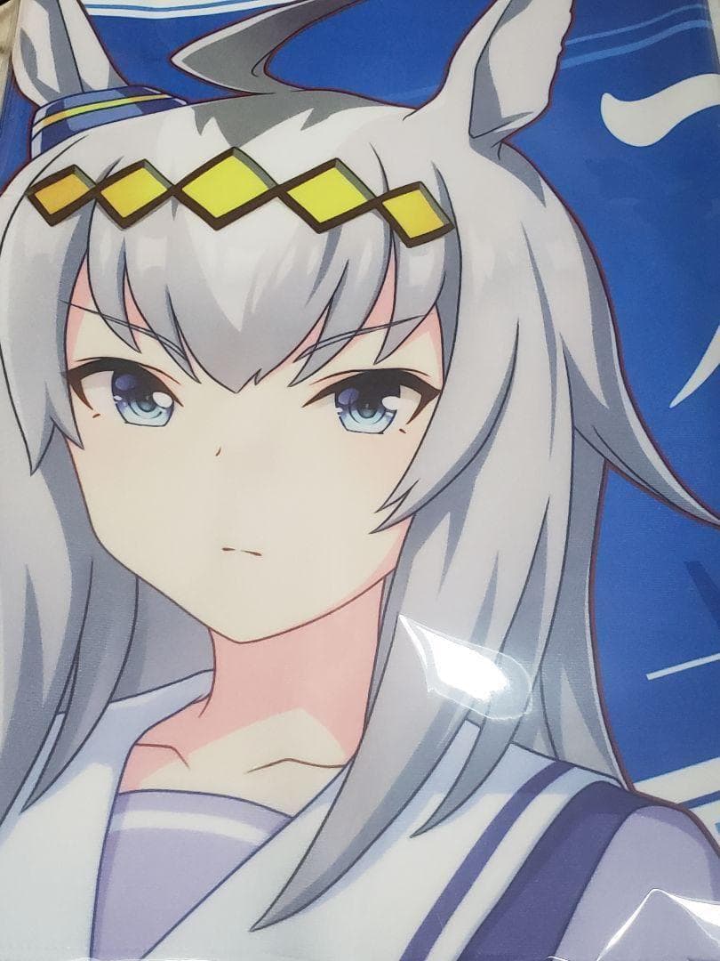 Close-up of the Oguri Cap character illustration printed on a blue Umamusume cheering towel.