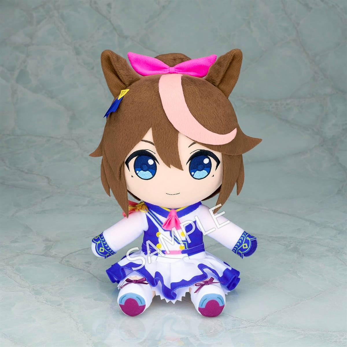 Seated plush toy of トウカイテイオー (Uma Musume Pretty Derby) wearing a blue and white outfit.