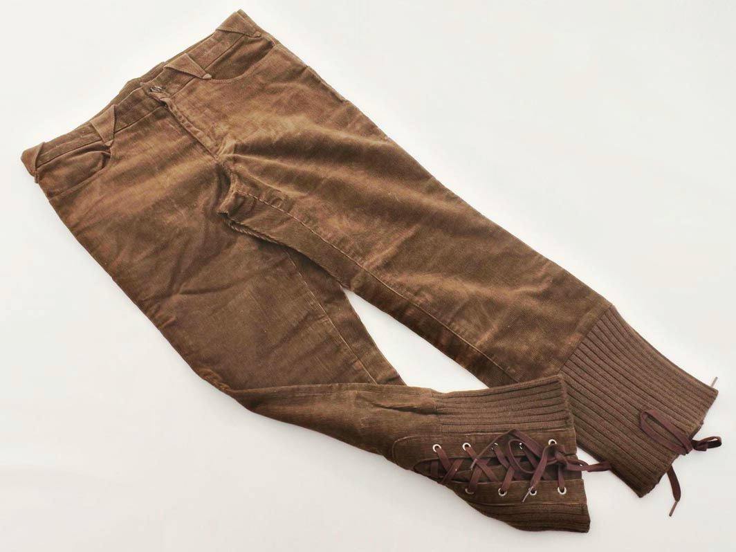 Brown corduroy lace-up pants laid flat on a white background.