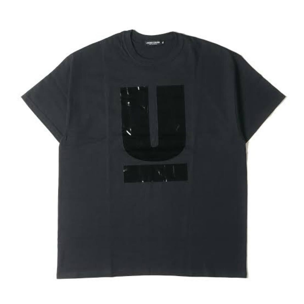 Front view of a navy UNDERCOVER U Logo print short-sleeve T-shirt laid flat.