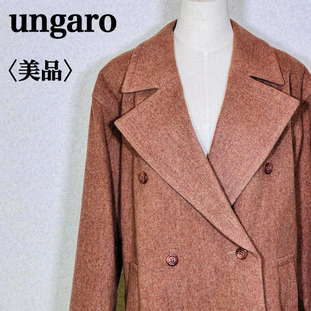Front view of a pink-brown wool women's double-breasted peacoat on a mannequin showing large lapels and buttons.
