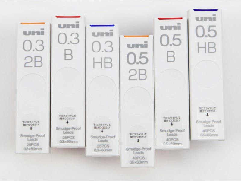 Front view of six Uni Smudge-Proof Leads boxes showing sizes (0.3, 0.5) and hardness markings.