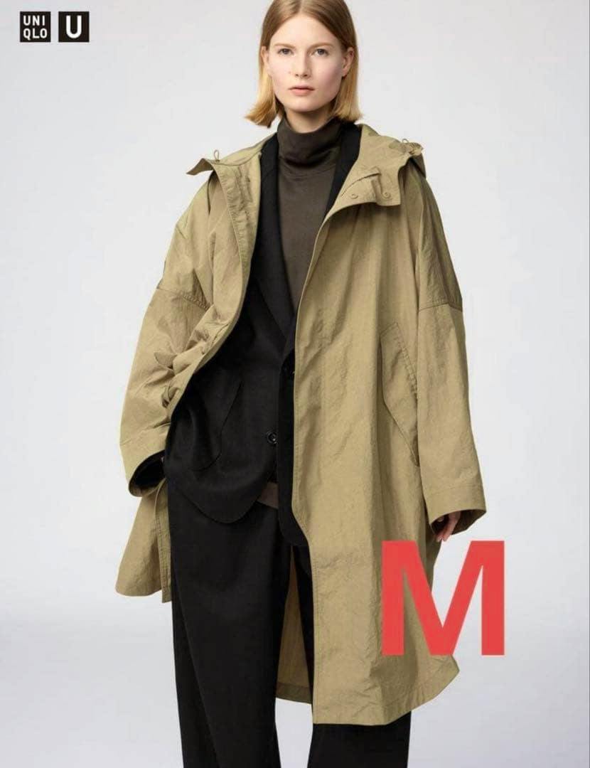 Front view of a khaki UNIQLO U hooded long coat (size M) worn by a model.