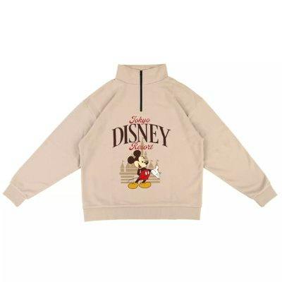 Beige unisex cotton sweatshirt with a short front zipper and a "Tokyo DISNEY Resort" Mickey Mouse graphic on the front.