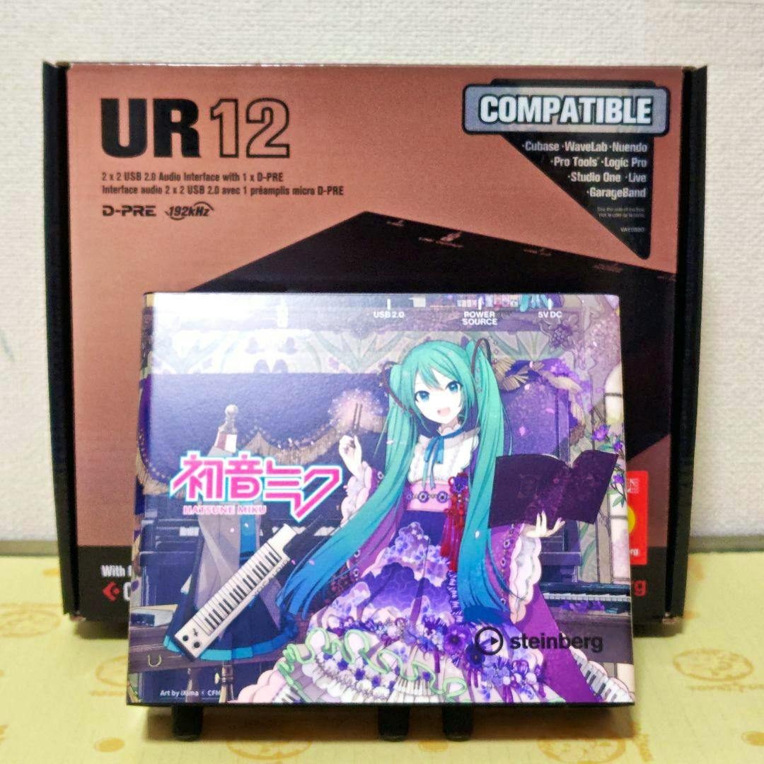 A UR12 audio interface retail box with Hatsune Miku 16th anniversary themed artwork displayed in front.