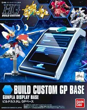 Box art for the Build Custom GP Base gunpla display base showing the base and a Gundam model mounted on the stand.
