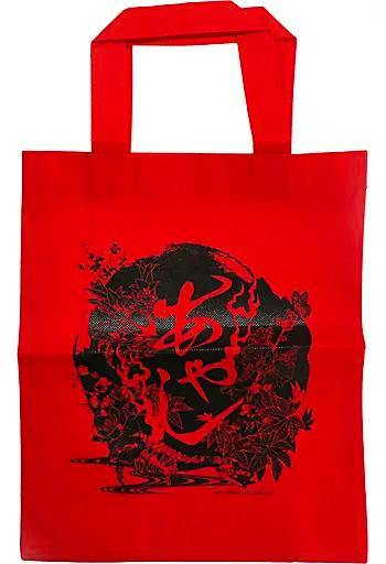 Red non-woven fabric bag with a black decorative illustration on the front and two short handles.