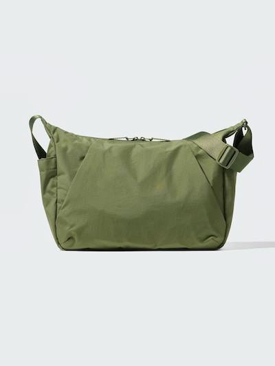 Front view of an olive-green nylon utility shoulder bag on a plain light background.