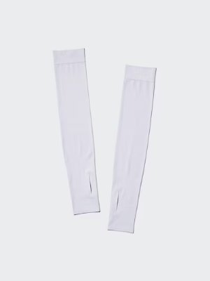 A pair of white seamless UV-cut polyester arm covers laid flat on a light background.