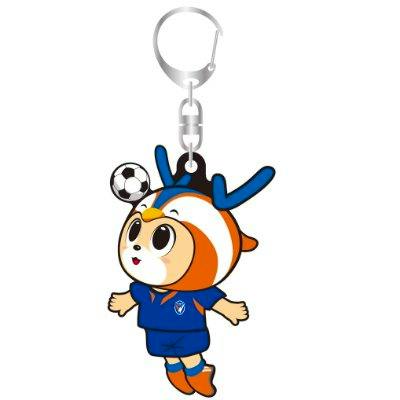 Rubber keychain showing the ヴィヴィくん character heading a soccer ball, attached to a metal key ring.
