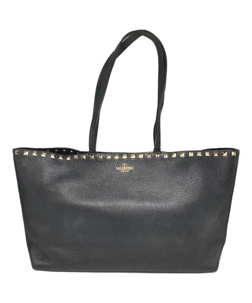 Black cow leather rockstuds tote bag with two shoulder straps and a row of studs along the top edge.